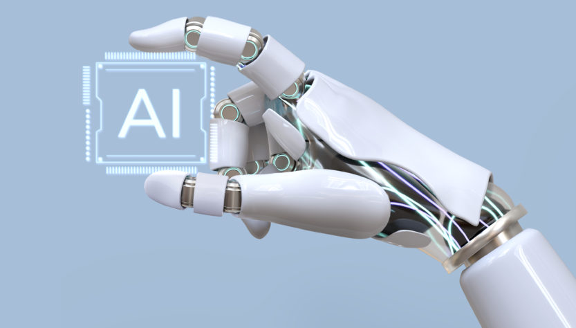 mano robotica con scritta AI